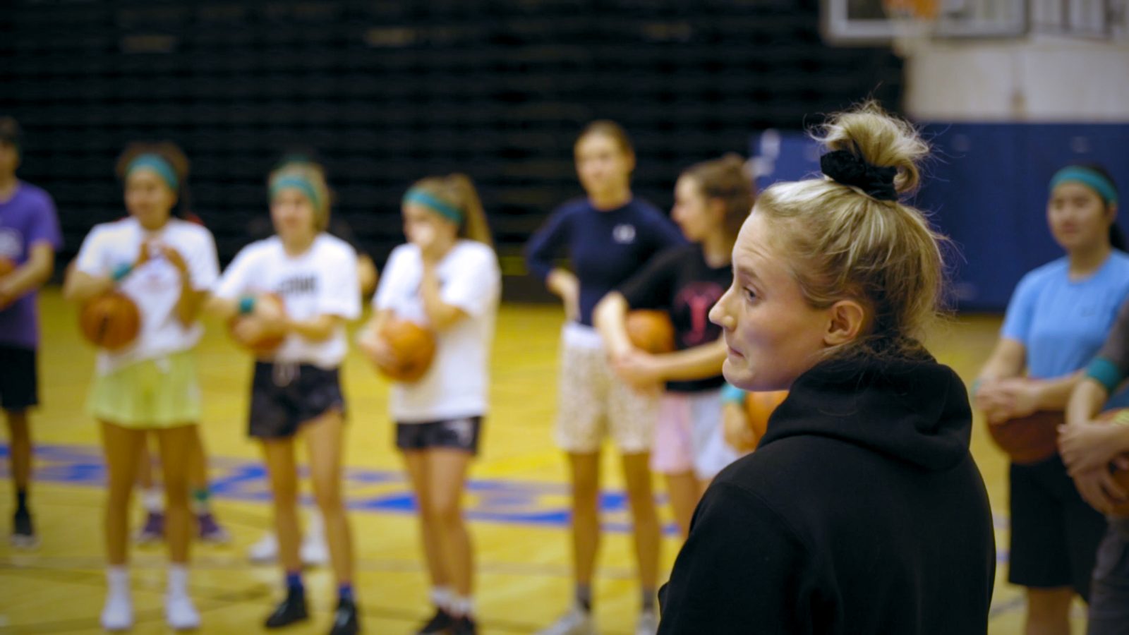 Girls' basketball clinic in a gym